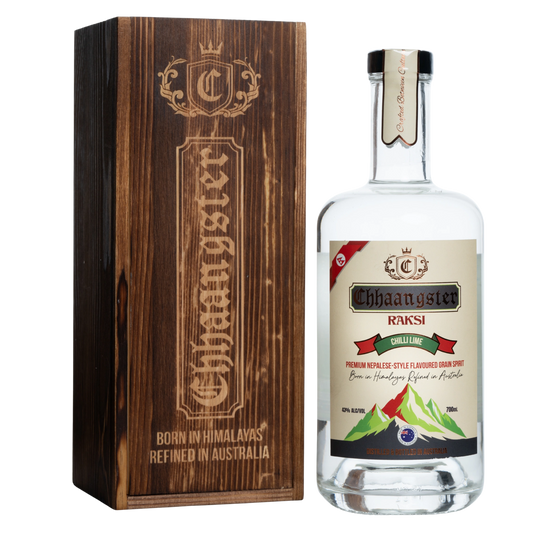 Chhaangster Raksi bottle and wooden box on a white background