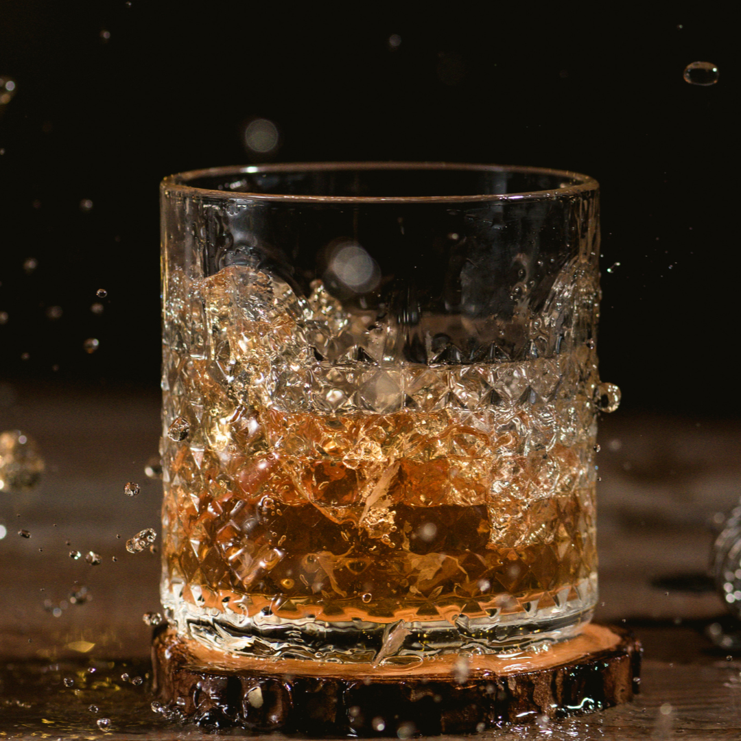 Glass with spirit  splashing